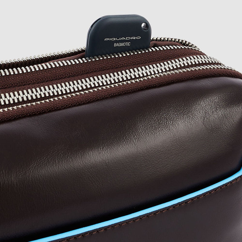 Wrist clutch bag with two dividers
