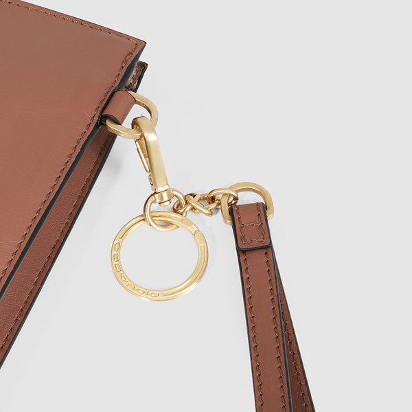 Zip-around clutch with iPad® compartment