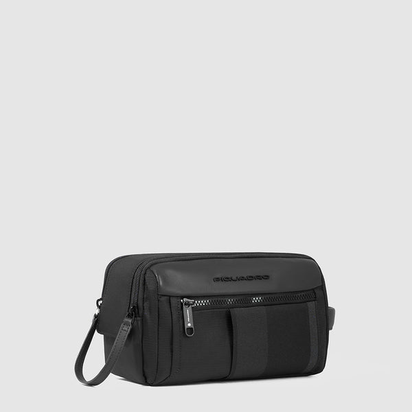 Toiletry bag in recycled fabric and leather