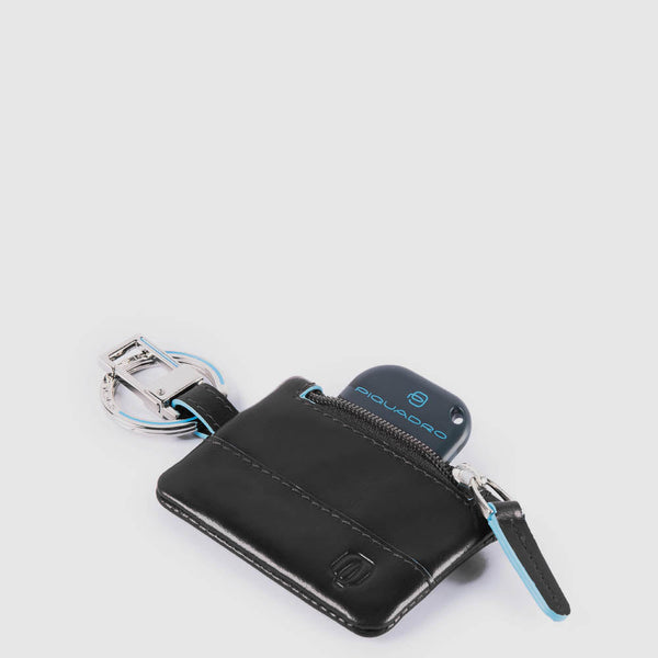 Keychain with CONNEQU and side zipped pocket