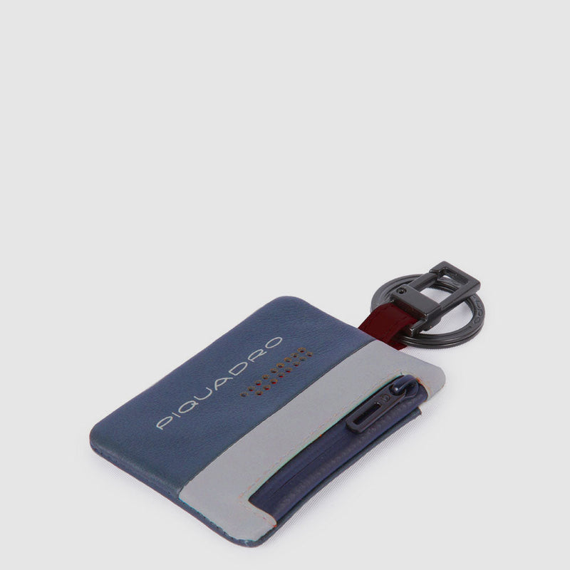 Keychain with CONNEQU and side zipped pocket