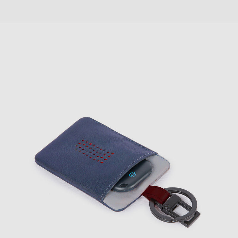Keychain with CONNEQU and side zipped pocket