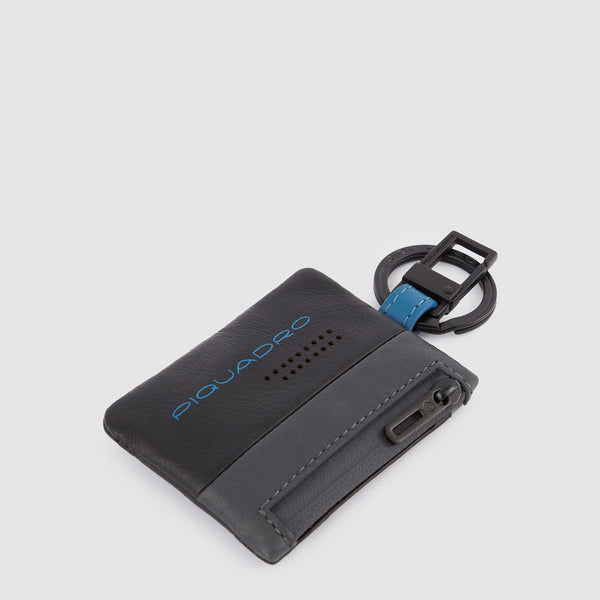 Keychain with CONNEQU and side zipped pocket