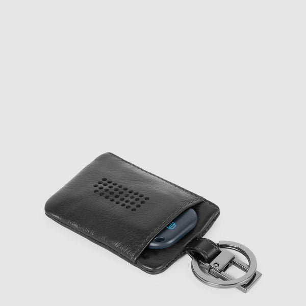 Keychain with CONNEQU and side zipped pocket
