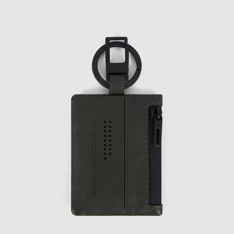 Keychain with CONNEQU and side zipped pocket