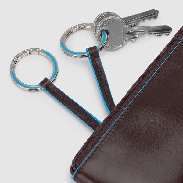 Two-ring key case with zipped rear pocket